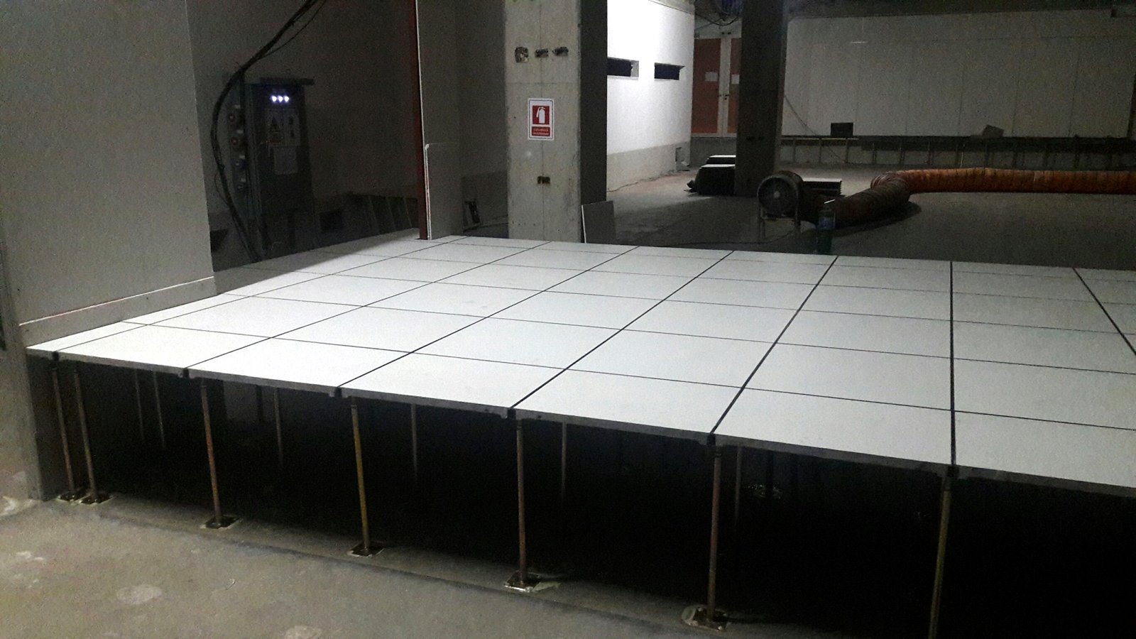 RHINO raised floor system with anti-static HPL panels on adjustable pedestals, installed by ANBS in Thailand